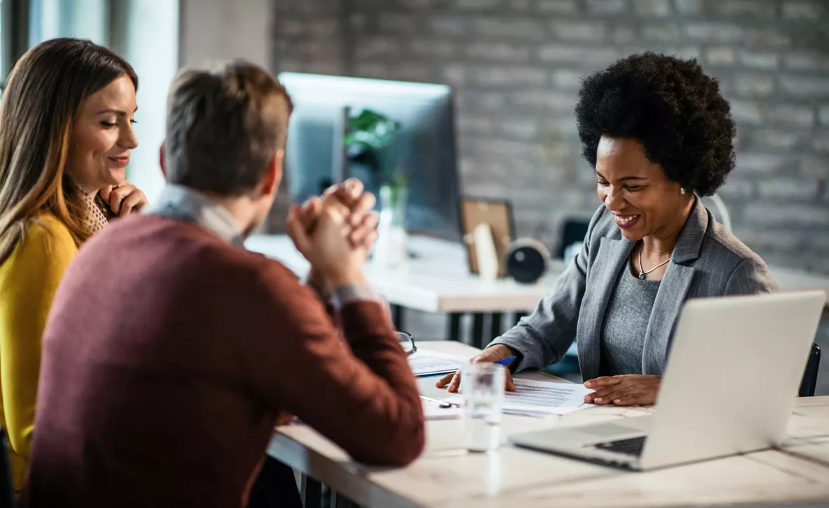 Person reviewing loans and financial plan with advisor